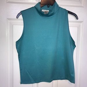 Carly did sleeveless fitted mockneck